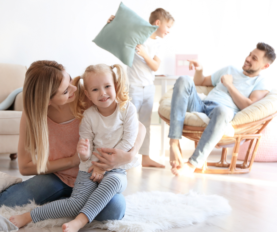 natural light health benefits, happy family in brightly lit living room